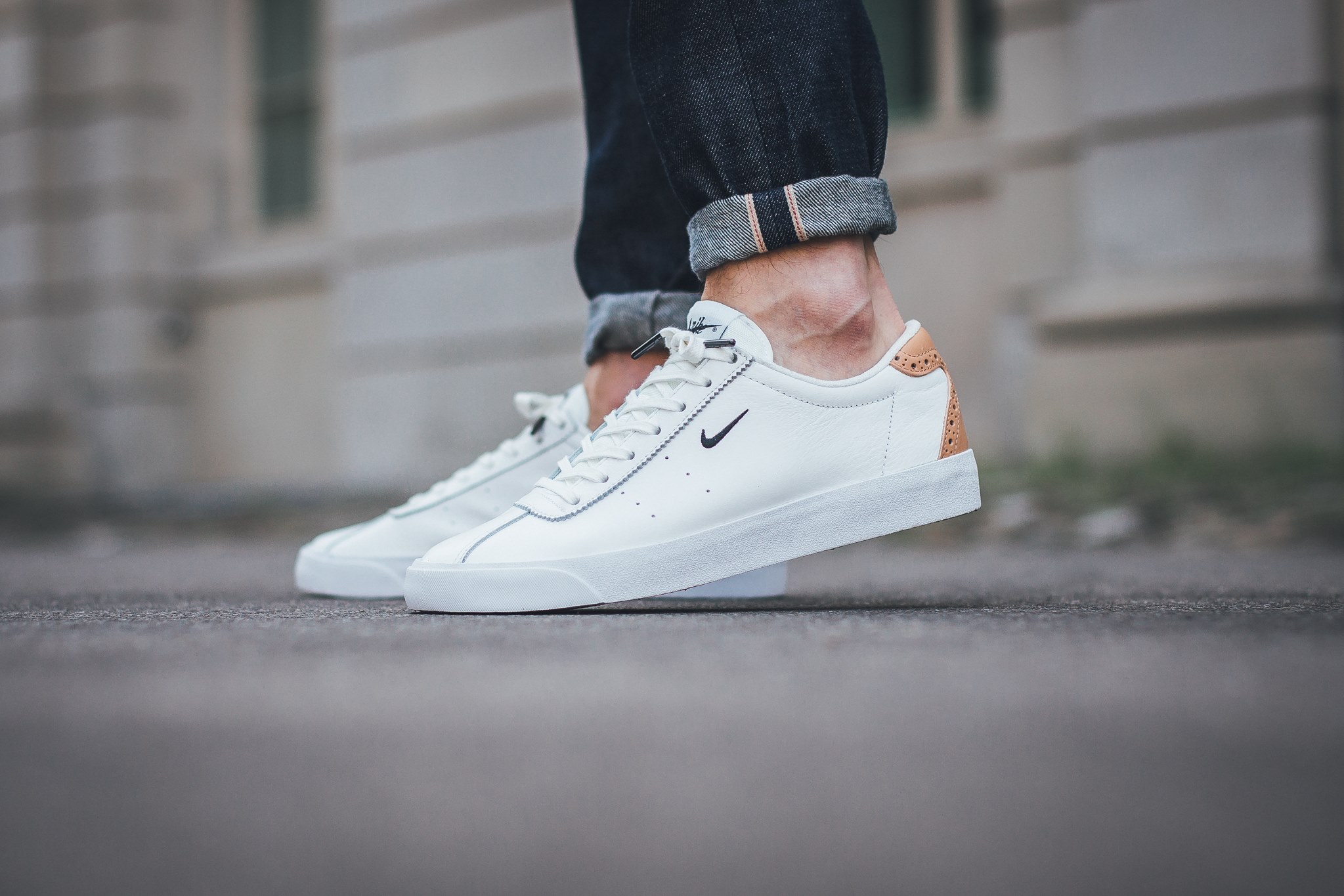 tan white nike