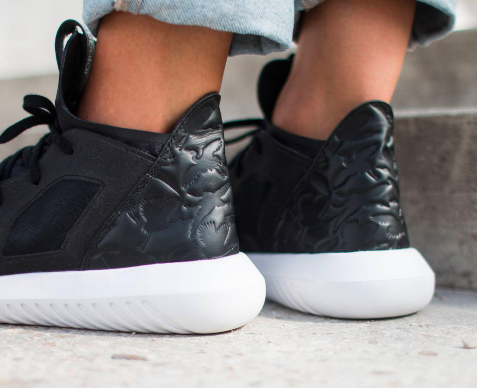 tubular defiant black white