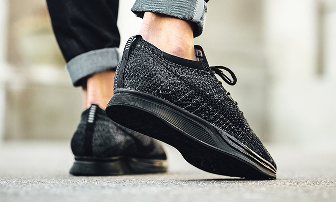 nike flyknit racer triple black uk