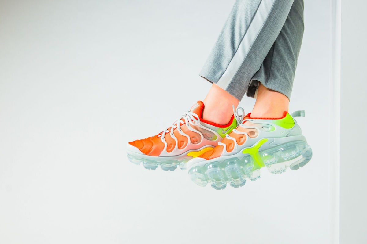 gray and orange vapormax