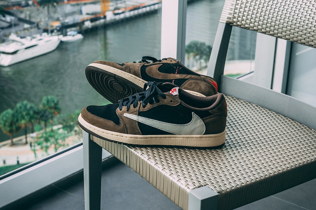 travis scott 1 low on feet
